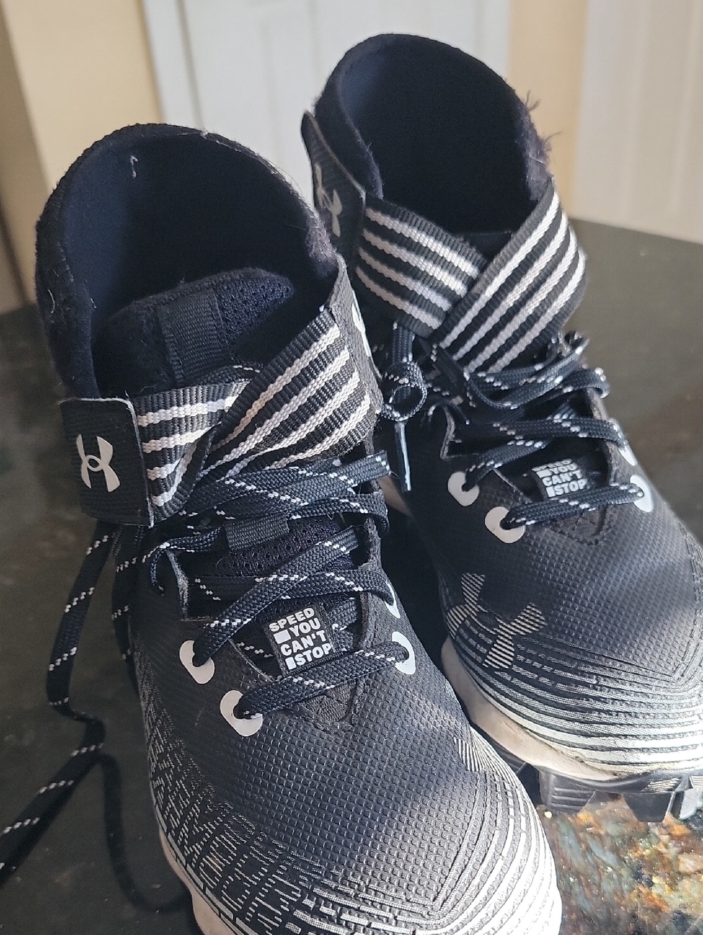 Under Armour Black and White Kids' Cleats with Strap